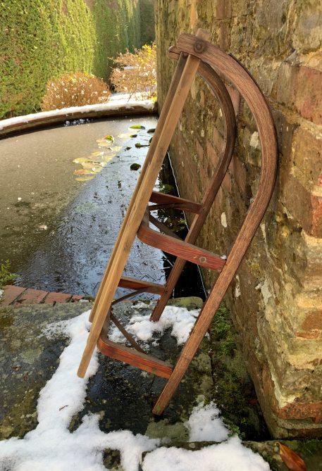 A Vintage Wooden Sleigh with Metal Edged Runners and Bar - Image 4