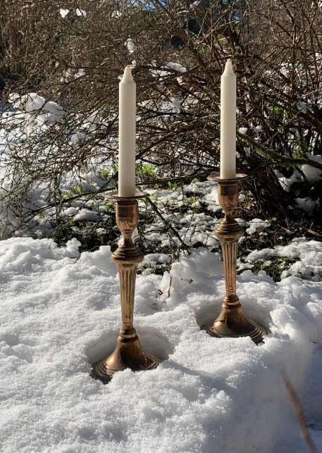 A pair of 18th Century Seamed Bell Metal Candlesticks, on Circular Bases