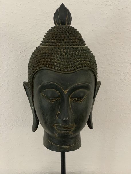 An Elegant and Handsome Buddha Head on a Plinth