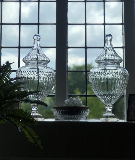 A Fine Pair of Cut Glass Pedestal Jars and Covers