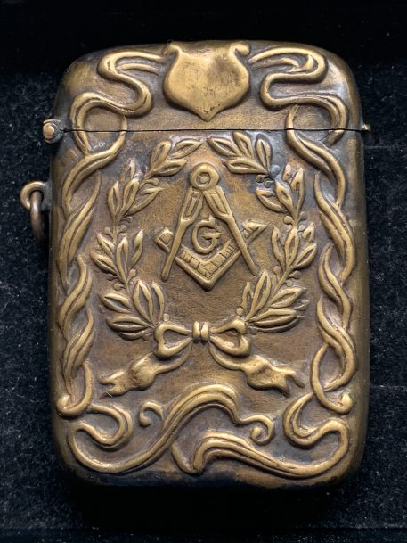 A Brass Masonic Rectangular Vesta Case with Freemason Square & Compass