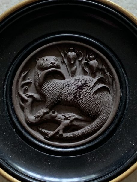 A Miniature Round Otter Wall Plaque By Ceramico - Image 3