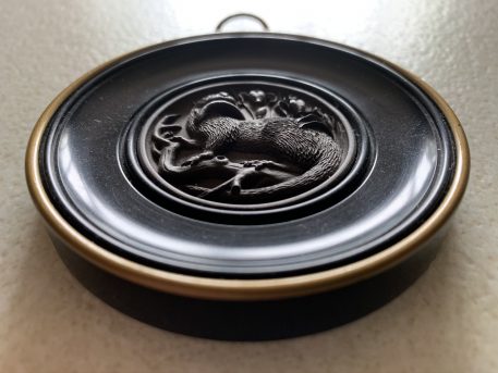 A Miniature Round Otter Wall Plaque By Ceramico - Image 2