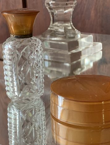 An Art Deco Cut Glass Scent Bottle with Faux Tortoiseshell Top