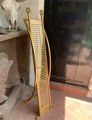 Gilt coloured and stylish metal CD Rack