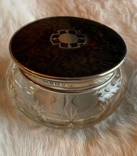A cut glass vanity pot with Silver and Tortoiseshell lid