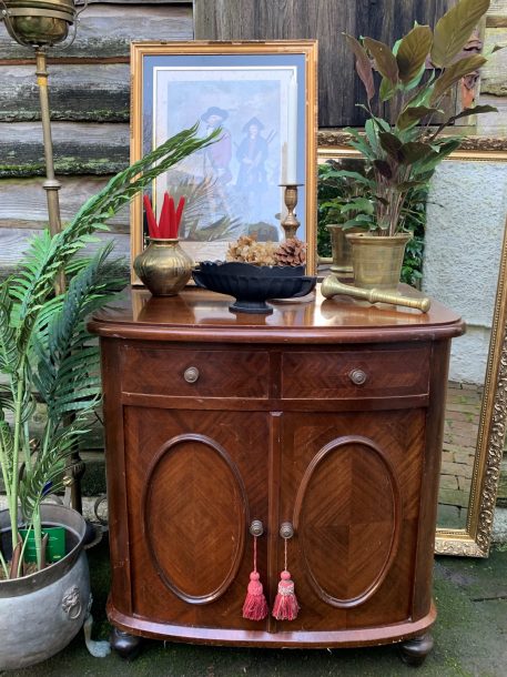 Regency style mahogany bowfront serving cabinet