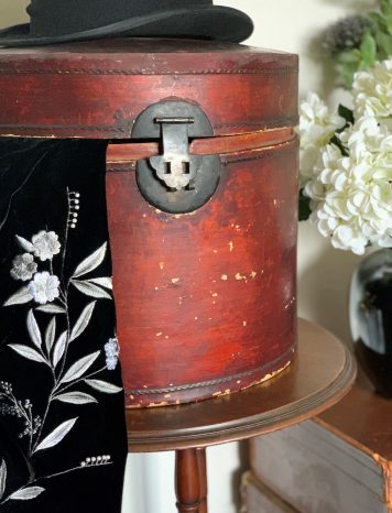 Chinese Red Lacquer Bamboo and Leather Hat box with fitted lid.