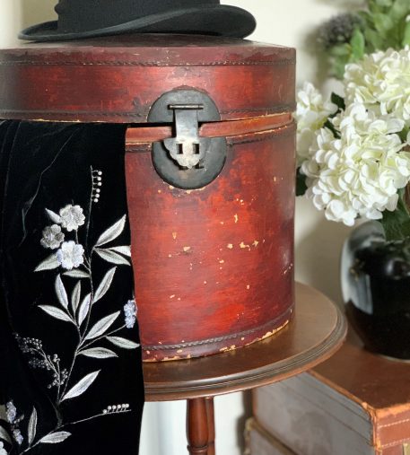 Chinese Red Lacquer Bamboo and Leather Hat box with fitted lid.